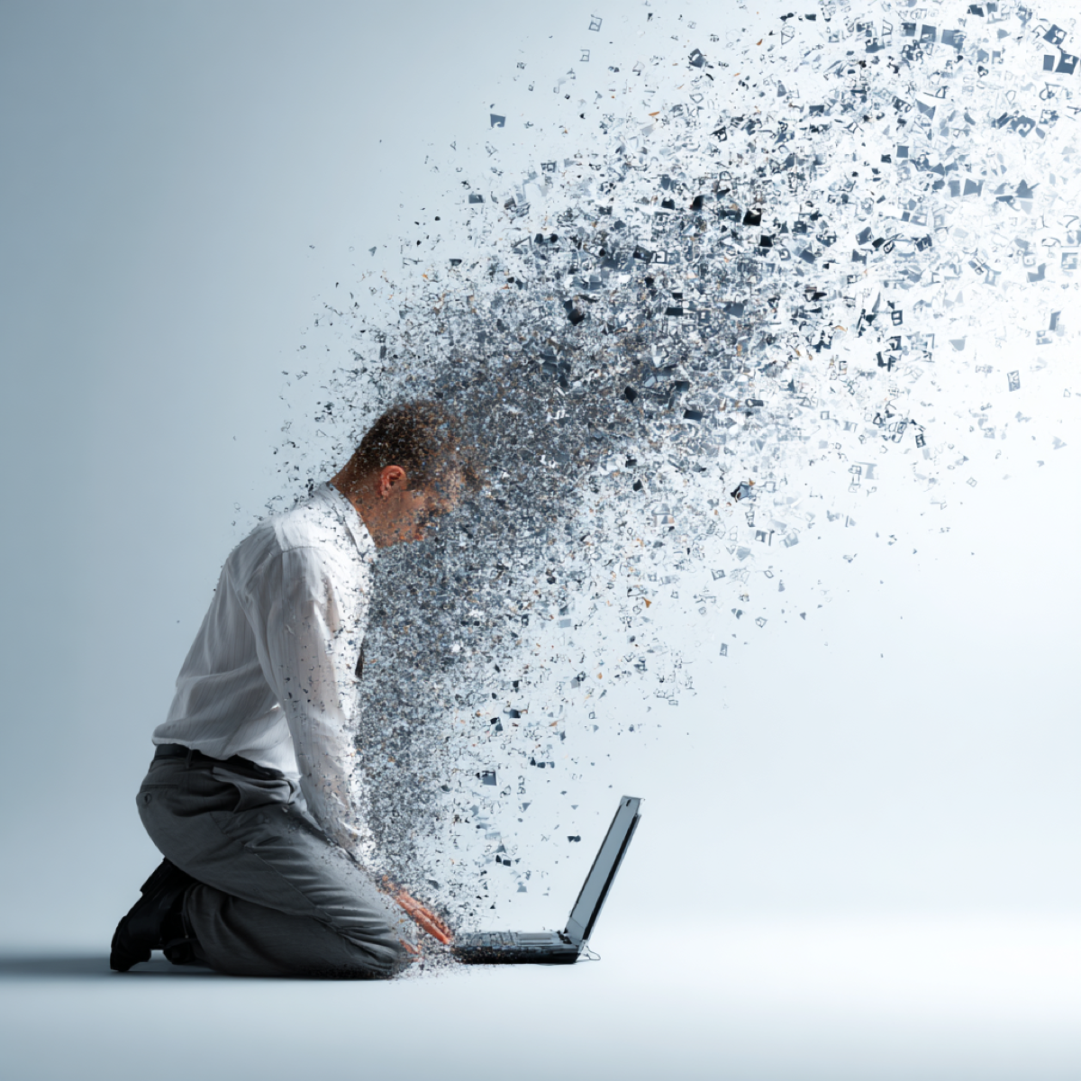 Content removal gets harder over time - businessman overwhelmed by digital fragmentation representing escalating difficulty of removing content as it spreads across platforms