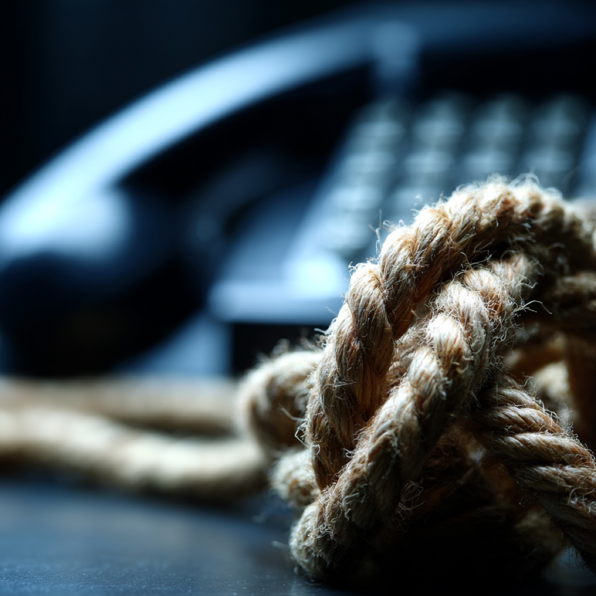 Sugar daddy blackmail destroys lives - rope bondage with scales of justice representing legal constraints and binding nature of blackmail schemes that trap victims in devastating psychological and financial exploitation cycles